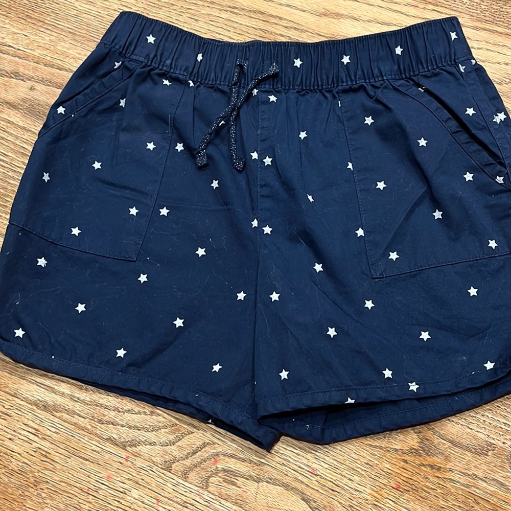 These are 4th of July shorts. Size 10-12 girls. Never worn.  White stars navy.
